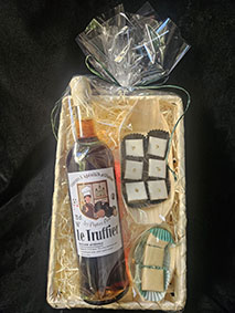 Coffret prestige : Poire et truffe Noire. Apéritif à la truffe et califassons poire et poivre de Sichuan et poire et truffe noire. 45 €